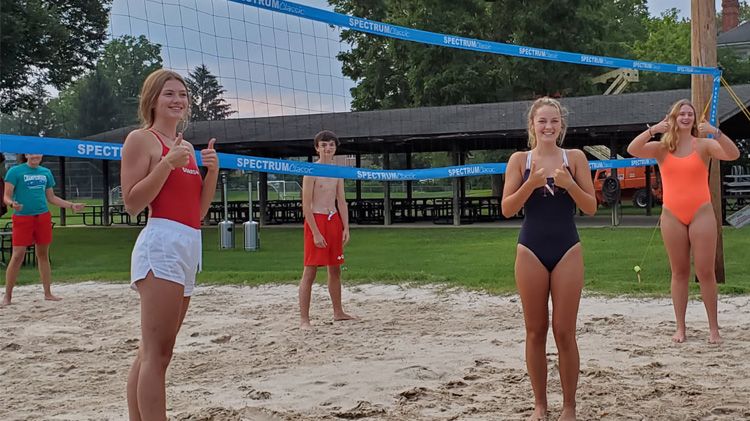 Volleyball court with players
